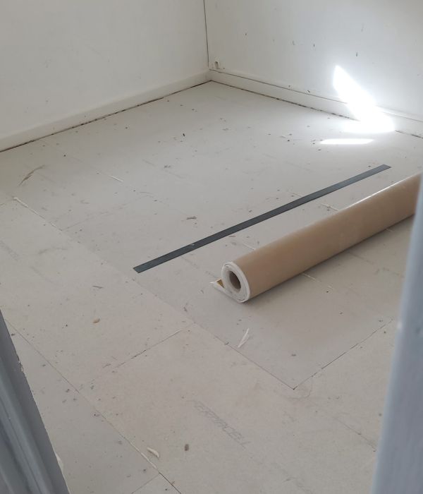 Pose d'un sol acoustique avant pose d'un parquet flottant
